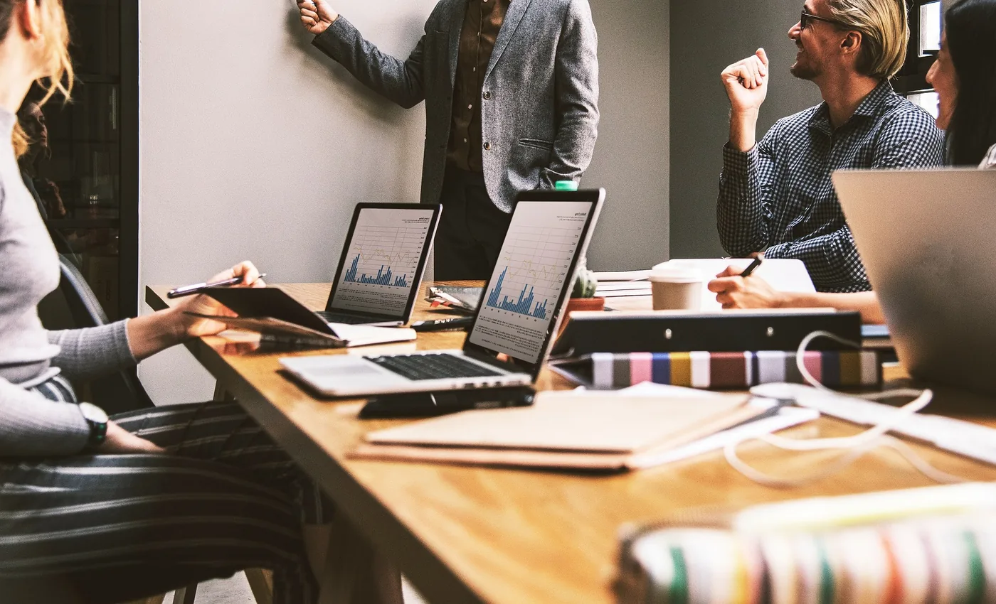Business leaders planning around a conference table